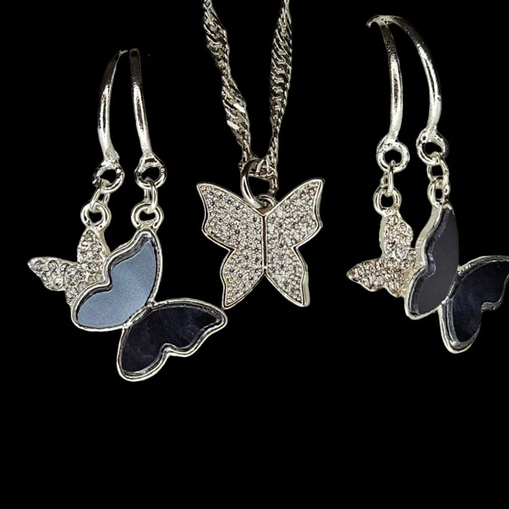 Silver butterfly necklace and earrings